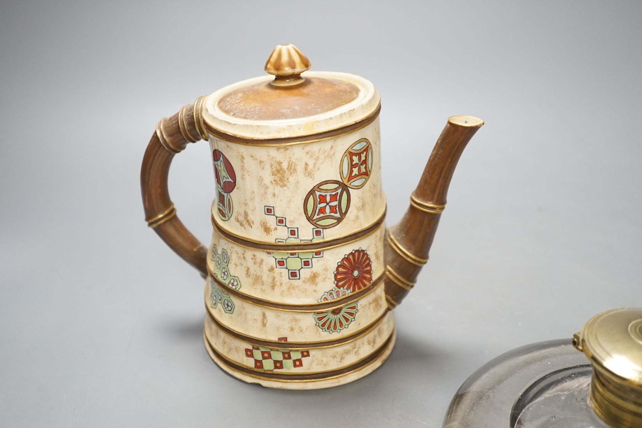 A Royal Worcester Japanese taste coffee pot and a Victorian glass squat shaped inkwell, with a brass lid (2)